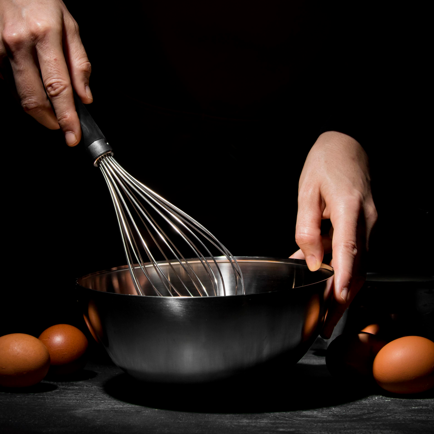 various kitchen utensils on wooden table